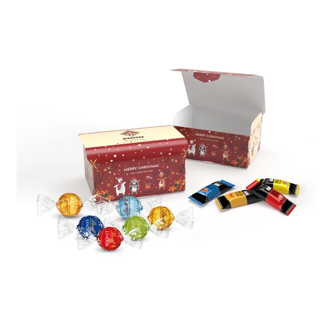 Firmengeschenk Lindt Schatztruhe – mit schokolade – mit bedrucktem Etikett als hochwertiges Weihnachtsgeschenk für Kunden und Partner