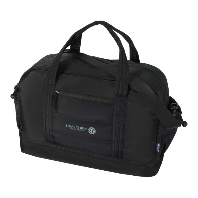 Premium-Werbeartikel Reisetasche Puffer GRS – schwarz – mit 48h Express-Logodruck 30L aus 100% recycelten Materialien nachhaltiges Reisegepäck