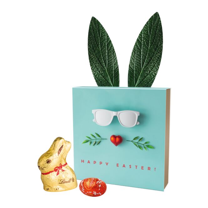 Oster-Werbeartikel Lindt Mischung – ostern – mit individueller Banderole in Kartonage als süßes Oster-Werbegeschenk für Kunden und Partner